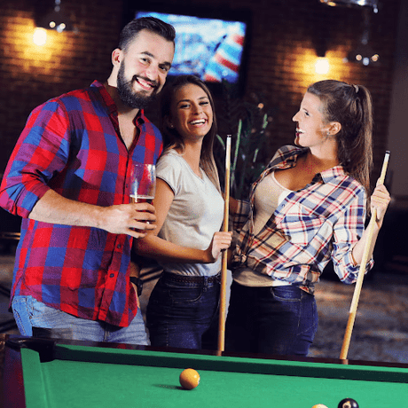 Sipping And Striking: Etiquette For Drinking Around A Pool Table